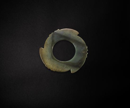 Lot 33_A Rare Jade Notched Disk, Xuanji, Neolithic Period to Shang Dynasty